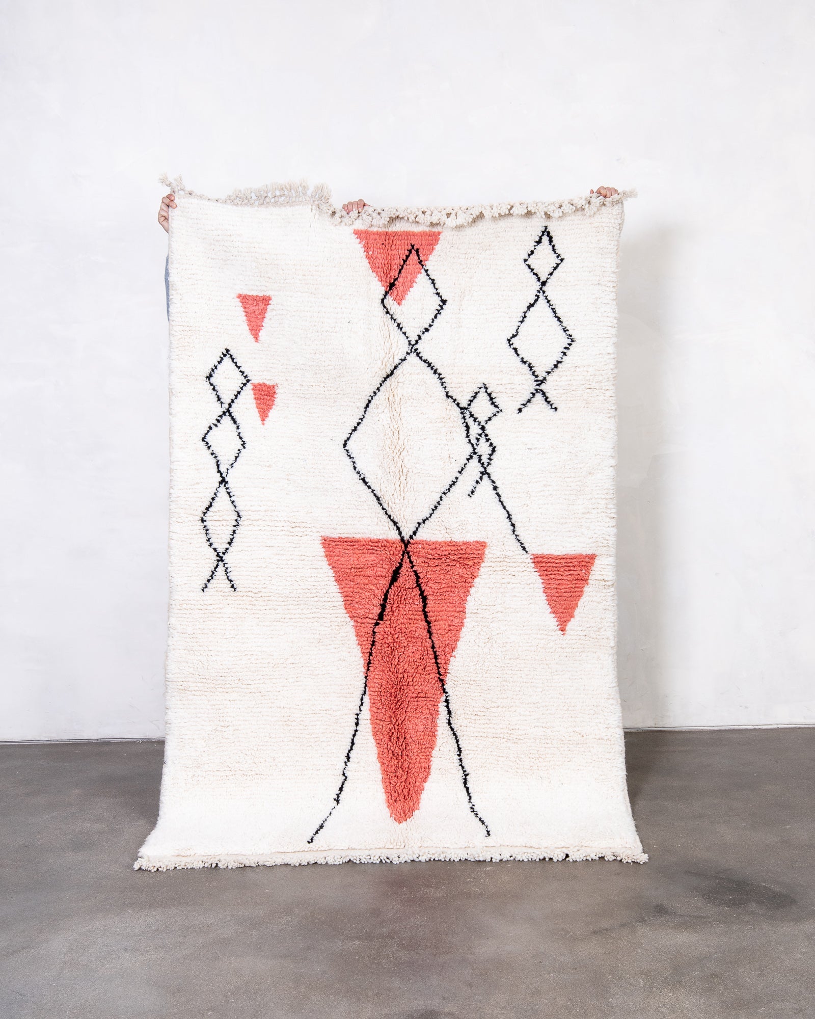 Modern, designer, handcrafted Berber rug from Morocco. Beniourain carpet with beautiful colours and patterns and fluffy wool texture.